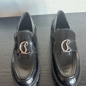 Stunning Christian Louboutin CL Moc Lug leather loafers in black. New